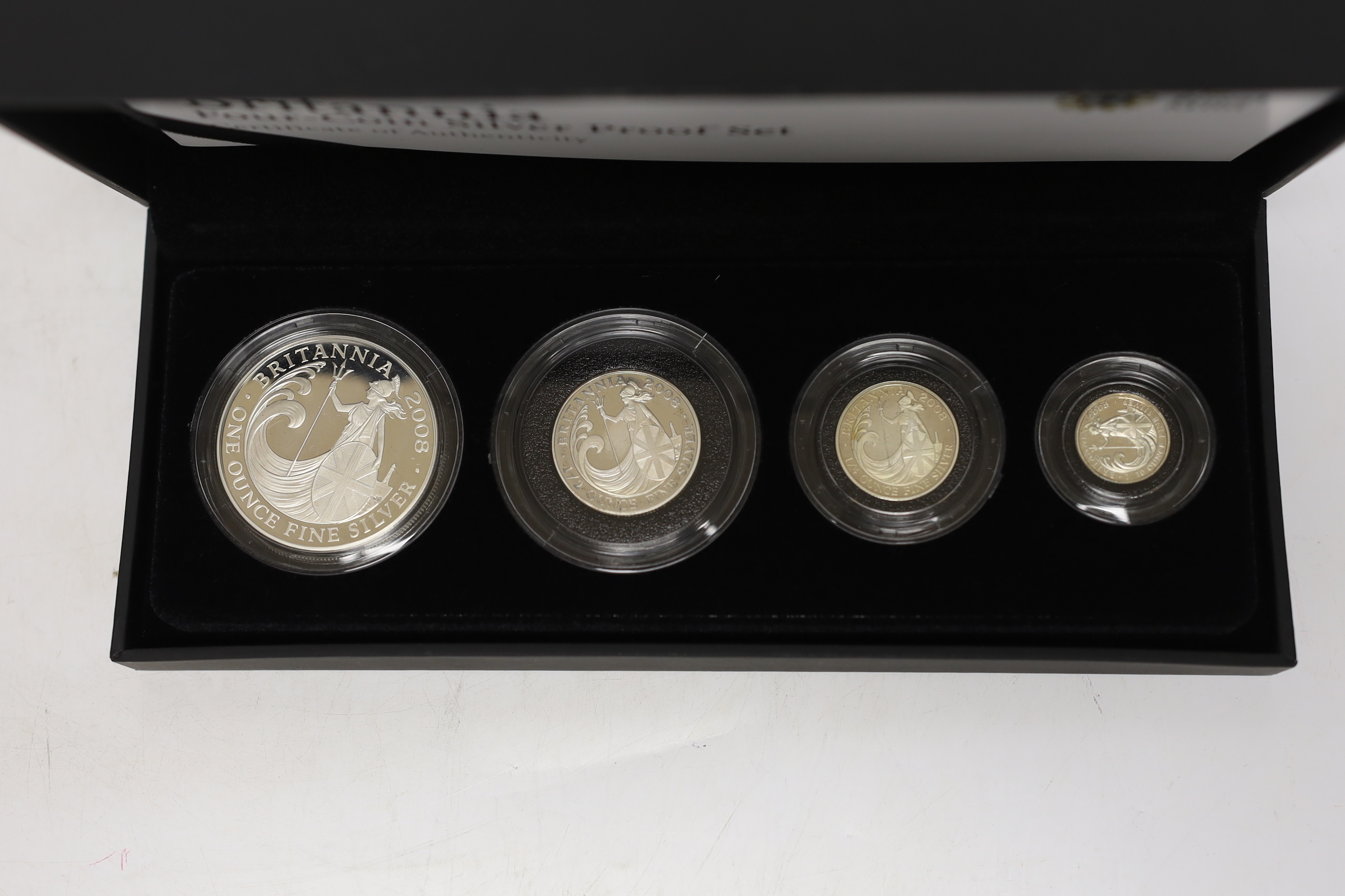 Three Royal Mint UK QEII four-coin silver proof Britannia collection sets for 1998, 2001 and 2008, 3 cases